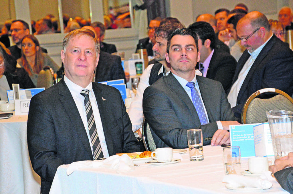Left, Laval mayor Marc Demers and Pierre-Luc Girard, president of the Laval Chamber of Commerce and Industry which co-sponsored the real estate forum.