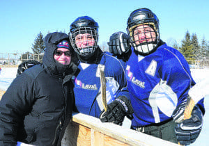 The Sir Wilfrid Laurier School Board’s Susan O’Keefe poses with two members from the rival team – councillors David De Cotis and Paolo Galati
