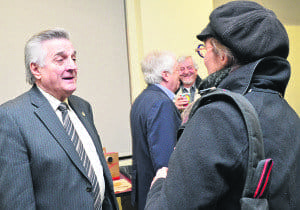 Marc-Aurèle-Fortin Liberal MP Yves Robillard, left, chats with a constituent during a consultation meeting held on Feb. 10 in preparation for the upcoming federal budget.
