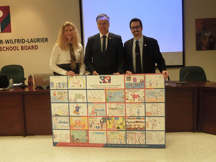 Mr. Ouellette received a mural created by various students