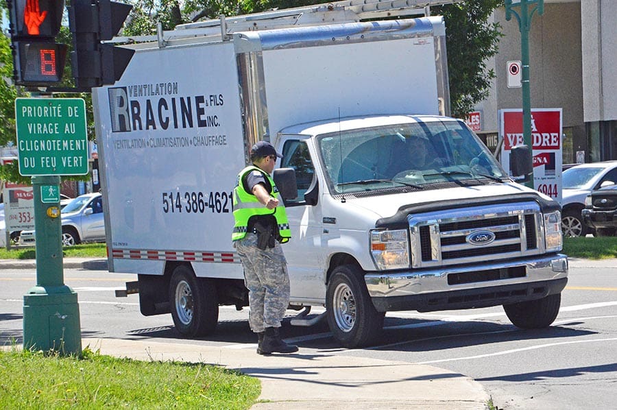 Officers flagged down motorists from Curé Labelle Blvd. as part of their accident prevention event.