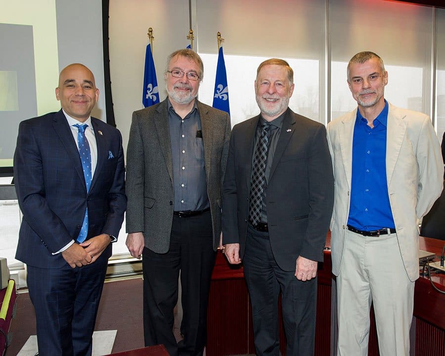 Dignitaries pay homage to Quebec’s Fleur de Lys flag