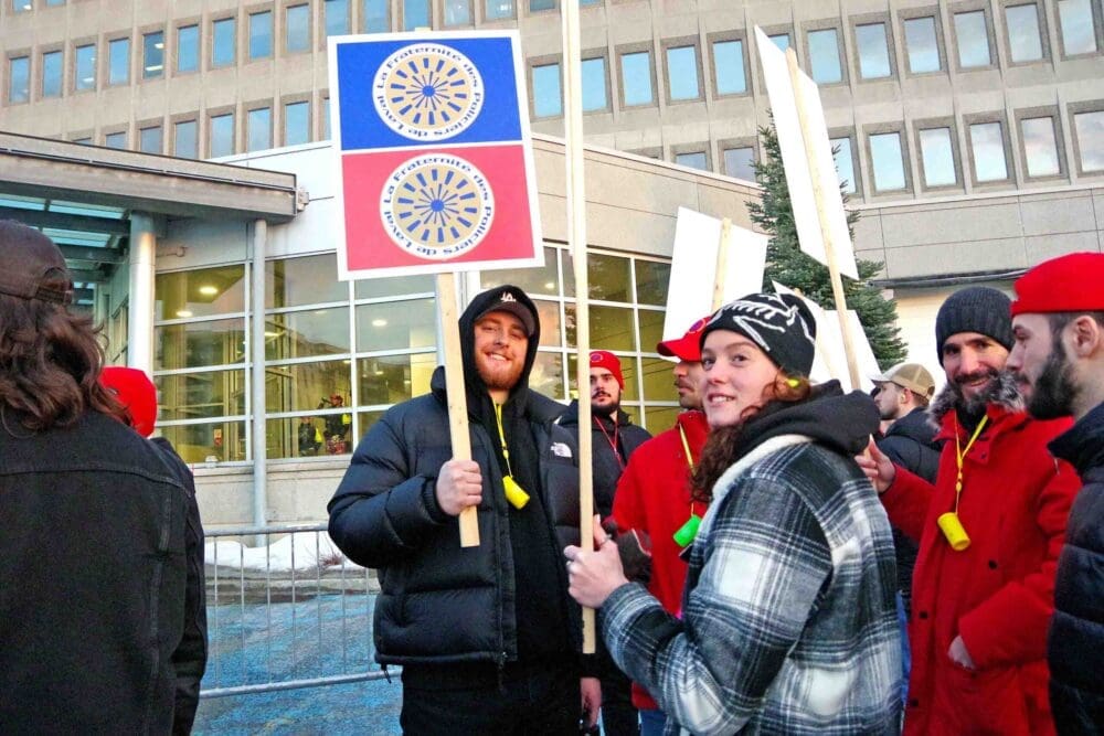 Laval’s blue collars and police stage noisy blitz outside council meeting